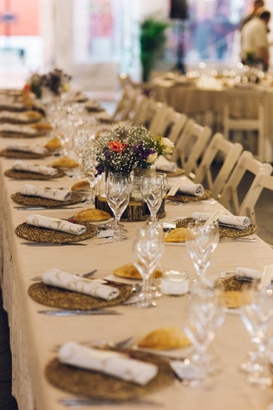 Retro empty vintage style wooden chairs for events and weddingsの写真素材
