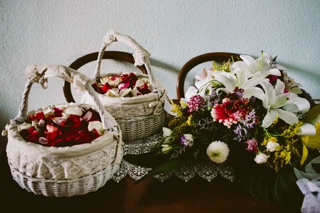 Bridal bouquet held by her with her hands at her weddingの写真素材