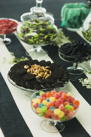 Candy Bar. Delicious sweet buffet with cupcakes and jelly beansの写真素材