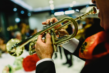 Mexican musician with his trumpet and guitarsの写真素材