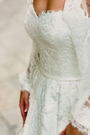 Detail of a white and elegant wedding dress.の写真素材