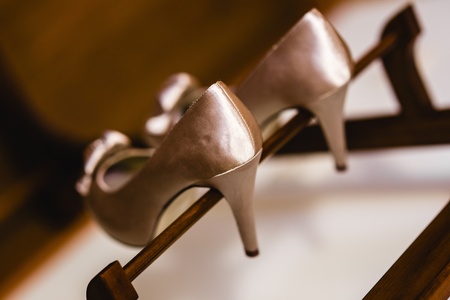Wedding shoes on their wedding isolated in a roomの写真素材