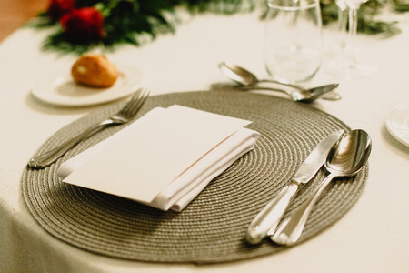 Decoration of the centerpieces of a wedding with the cutlery and vintage details.の写真素材