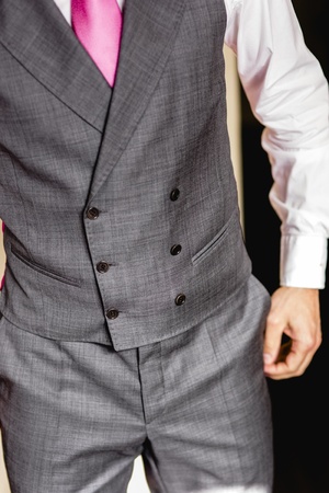 Groom getting ready to get married dressing