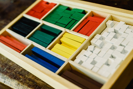 Blocks of different sizes and colors to build shapes and count.