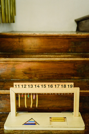 Hanger for color bead stairs, counting  in a montessori classroom
