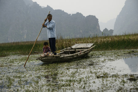 Sapa, Vietnam - July 18, 2013; Vietnamese farmers and fishermen in rural villages.のeditorial素材