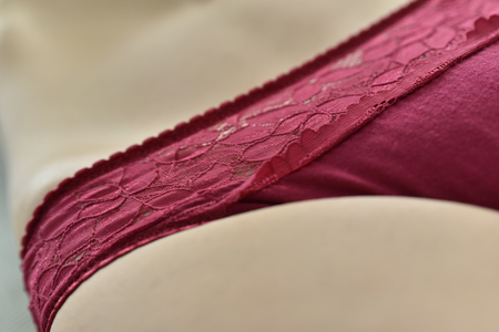 Women in red panties close-up, themed valentines.の写真素材