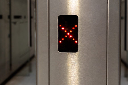 Electronic access doors to the subway closed with LED indicator.