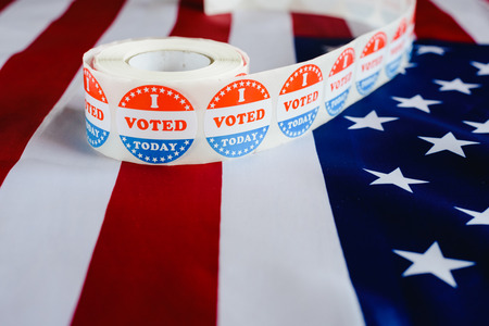 I voted today sticker, typical of US elections on American flag.