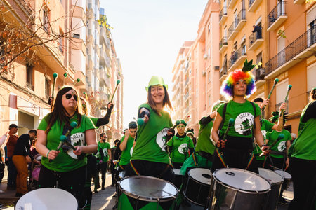 Valencia, Spain - February 16, 2019: Group of strong women belonging to a group of drummers during a feminist protest claiming rights.のeditorial素材