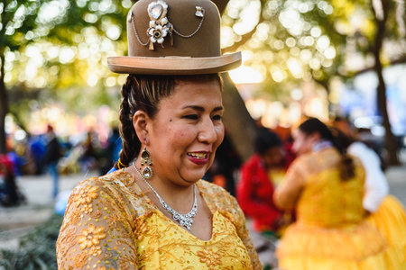 Valencia, Spain - February 16, 2019: Aymara woman wearing traditional rural Bolivia dress with hat during a parade.のeditorial素材