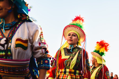Valencia, Spain - February 16, 2019: Woman performing the Bolivian folk dance the Tinku dressed in...