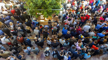 Valencia, Spain - March 7, 2019:  Crowded street seen from above full of tourists.