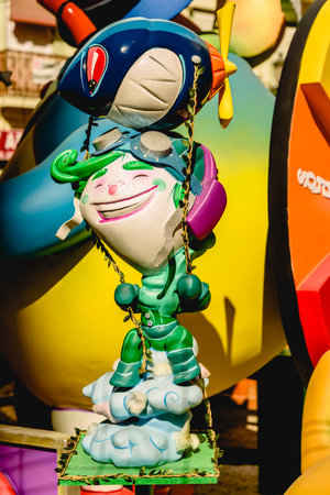 Valencia, Spain - March 16, 2019: Fallas stone cartons of a Falla profusely painted with striking...