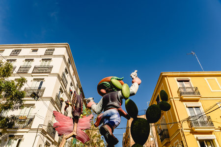Valencia, Spain - March 16, 2019: Fallas stone cartons of a Falla profusely painted with striking...