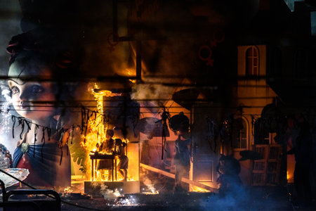 Valencia, Spain - March 19, 2019: Burning of the fallas children of Valencia, the smallest and first sculptures to burn.のeditorial素材