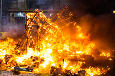 Valencia, Spain - March 19, 2019: End of the Valencian festivities of Fallas, Monument faller consumed in the fire in high flares.のeditorial素材