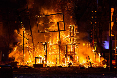 Valencia, Spain - March 19, 2019: End of the Valencian festivities of Fallas, Monument faller consumed in the fire in high flares.のeditorial素材