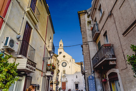 Bari, Italy - March 8, 2019: Entrance to the Cathedral Square Basilica of San Sabino de Bari with information cartels for tourists.のeditorial素材