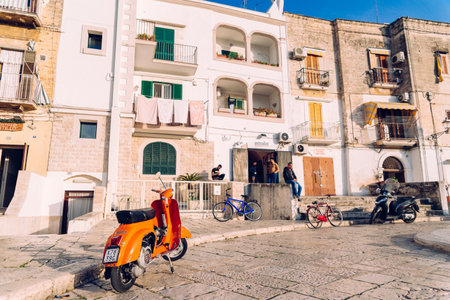 Bari, Italy - March 8, 2019: Young men spending time in a square in the Italian city of Bari.のeditorial素材
