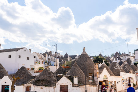Beautiful single-storey houses of rounded construction called trulli, typical of the area of Alberobello in Italy.のeditorial素材