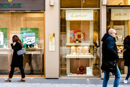 Bari, Italy - March 12, 2019: People in front of a showcase of the luxurious Cartier jewelry and watch storeのeditorial素材
