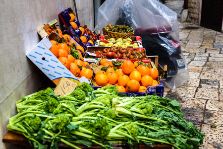 Matera, Italy - March 11, 2019: Fruit and vegetables in a mediterranean street market.のeditorial素材
