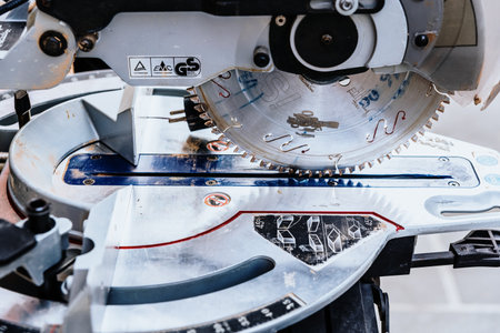 Bari, Italy - March 12, 2019: Professional electric circular saw Femi with 2 Blades to cut various types of materials such as metal, wood or ceramic.のeditorial素材
