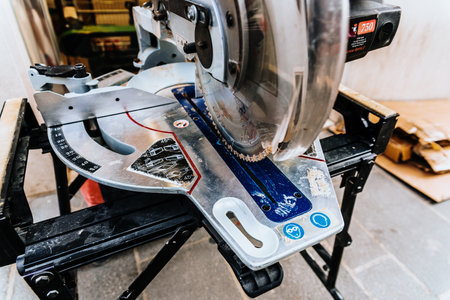 Bari, Italy - March 12, 2019: Professional electric circular saw Femi with 2 Blades to cut various types of materials such as metal, wood or ceramic.のeditorial素材