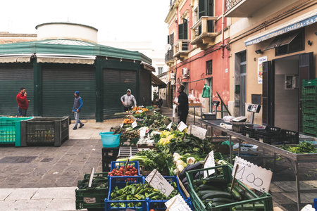 Matera, Italy - March 11, 2019: Fruit and vegetables in a mediterranean street market.のeditorial素材