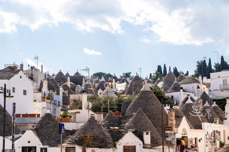 Alberobello, Italy - March 9, 2019: View of the streets of this curious Italian city visited by thousands of tourists.のeditorial素材
