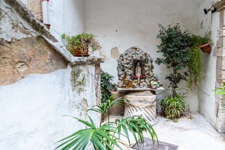 Bari, Italy - March 10, 2019: Religious sculpture of the virgin Mary in a square of an Italian city.のeditorial素材