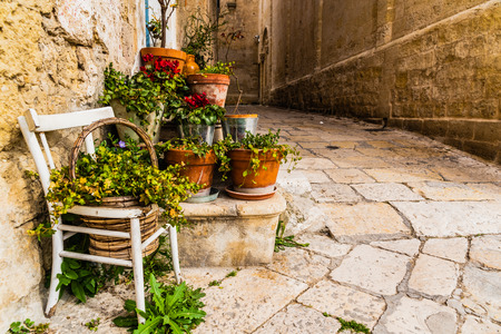 Narrow streets of the beautiful city of Bari, ideal for strolling when we tour in Italy.の写真素材