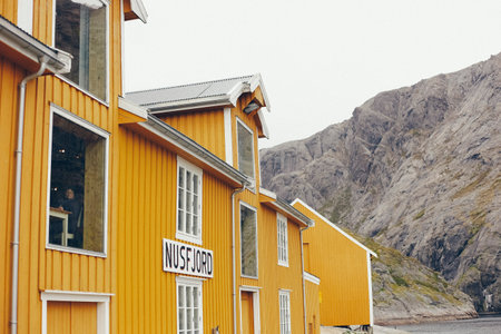 Nusfjord, Norway - May 28, 2015: Facade of a traditional fisherman's house overlooking the Nordic Seaのeditorial素材