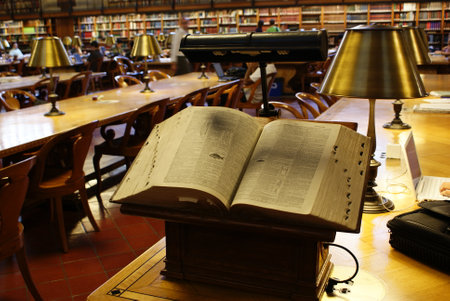 New york, usa- August 13, 2008: Ancient book, treaty of biology, opened in a lectern in a public library, headquarters of the knowledge of humanity.のeditorial素材