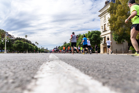 Valencia, Spain - May 19, 2019: Group of runners participating in a popular race.のeditorial素材