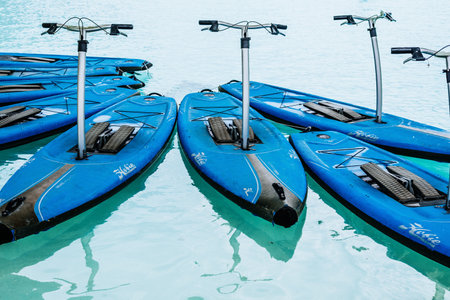 Valencia, Spain - May 18, 2019: Stand up pedal board surfing without anyone in an artificial lake, urban aquatic summer sports.のeditorial素材
