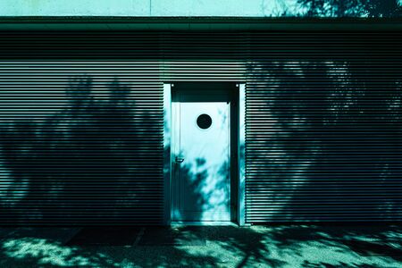 Emergency door in the back of office building.の写真素材