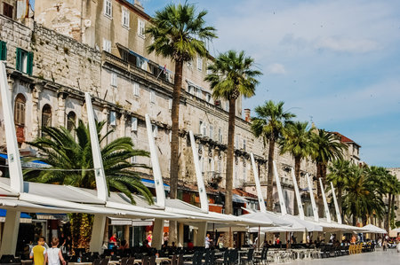Split, Croatia - June 1, 2019: Old town of Split, medieval city with streets full of tourists and religious buildings.のeditorial素材