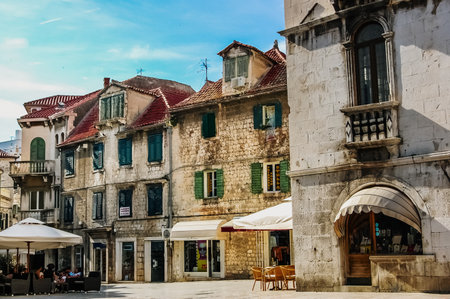 Split, Croatia - June 1, 2019: Old town of Split, medieval city with streets full of tourists and religious buildings.のeditorial素材