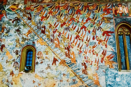 Bucovina, Romania - June 5, 2019: Paintings in frescoes of religious, colorful motifs, in Orthodox Christian monasteries of Bucovina.のeditorial素材