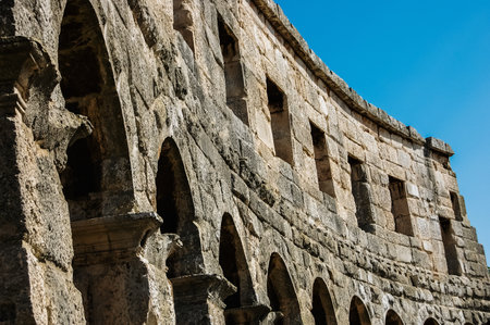Pula, Croatia - June 10, 2019: Roman amphitheater in Pula, the best preserved ancient monument in Croatia, visited by hundreds of tourists.のeditorial素材