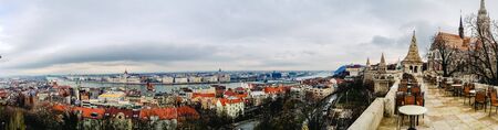 Overview of the Danube river as it passes through the European city of Budapest, Hungary, with Parliament in the background.の写真素材
