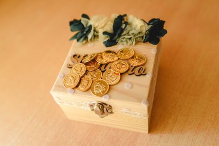 Gold coins used in the liturgy of Christian marriage in Spain.