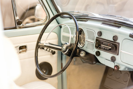 Valencia, Spain - June 1, 2013: Dashboard of an old European car with a large steering wheel.のeditorial素材