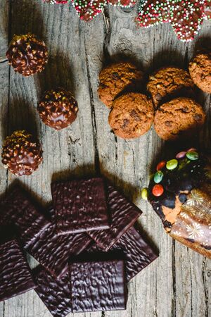 Chip cookies and chocolates pralines to take pleasure in Christmas holidaysの写真素材