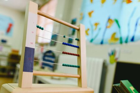 Wooden abacus to learn to count and do addition and subtraction, montessori education for children.の写真素材