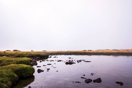 High mountain lake protected by its special flora and fauna.の写真素材