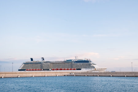 Valencia, Spain - November 1, 2019: A cruise ship of the Celebrity Cruises Reflection company docks at the port of Valencia with thousands of tourists.のeditorial素材